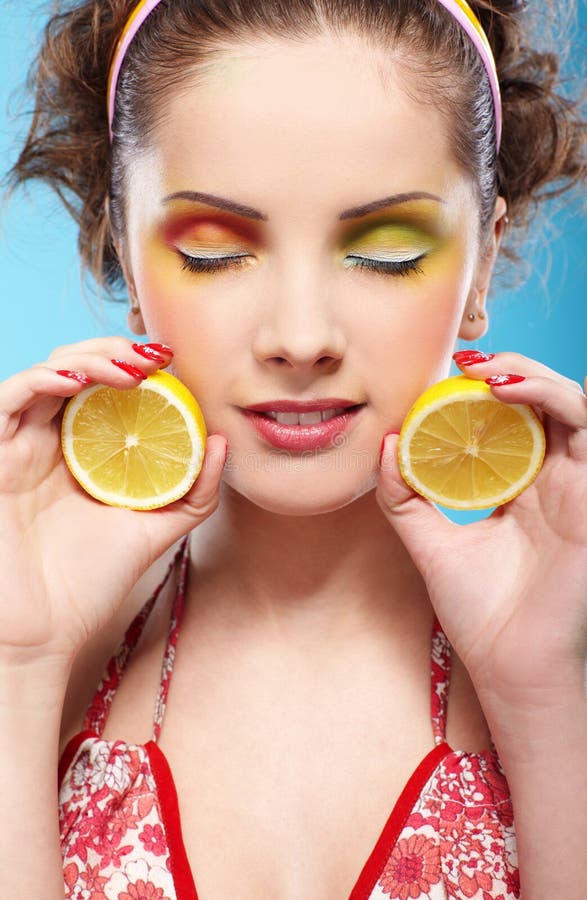 Beautiful girl with lemon