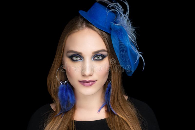 Beautiful girl massive accessory earrings feather jewellery stock images Beautiful girl massive accessory earrings feather jewellery stock images