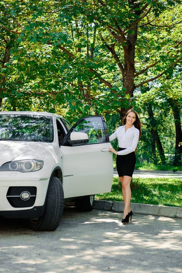 Beautiful Girl Opens the Door of Her Car Stock Image - Image of happy ...