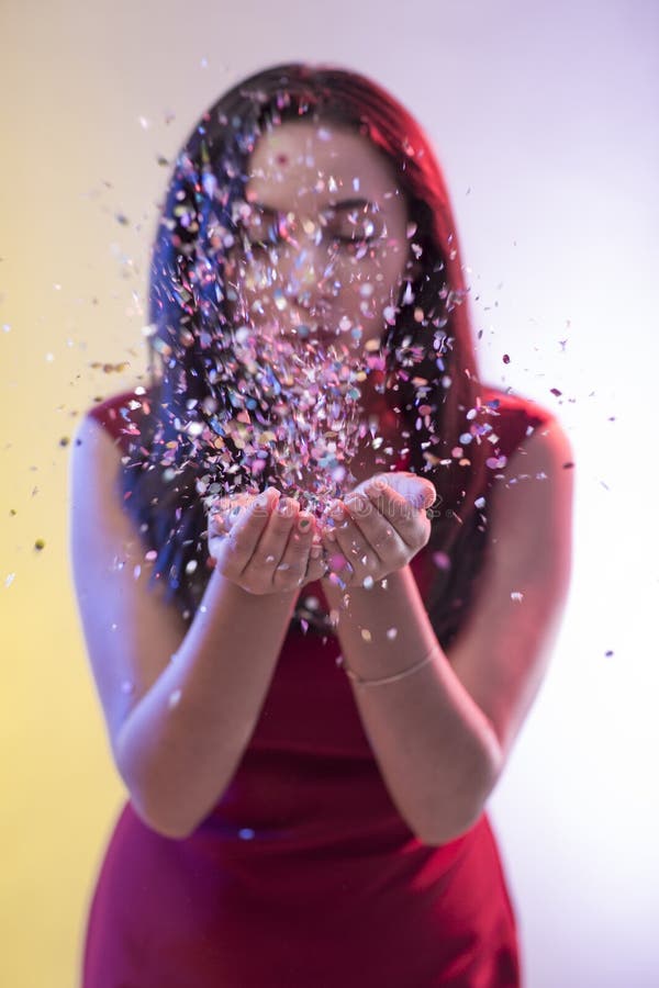 Beautiful Girl Blowing Confetti Stock Image - Image of bright, campaign ...