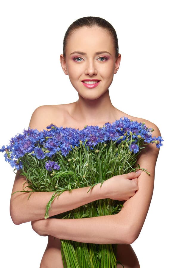 Beautiful girl with pink peony flowers