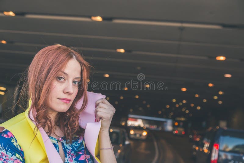 Beautiful girl posing in the city streets