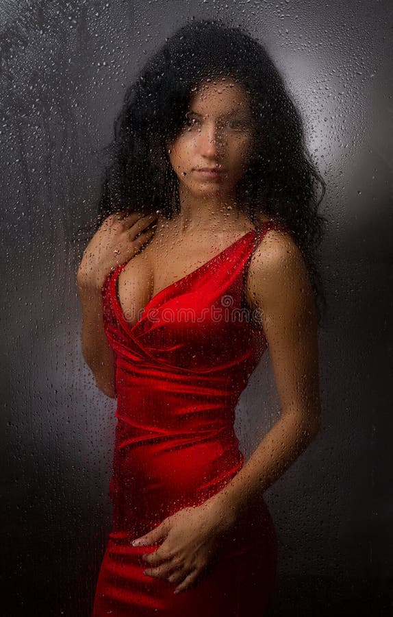 Beautiful girl in a red dress