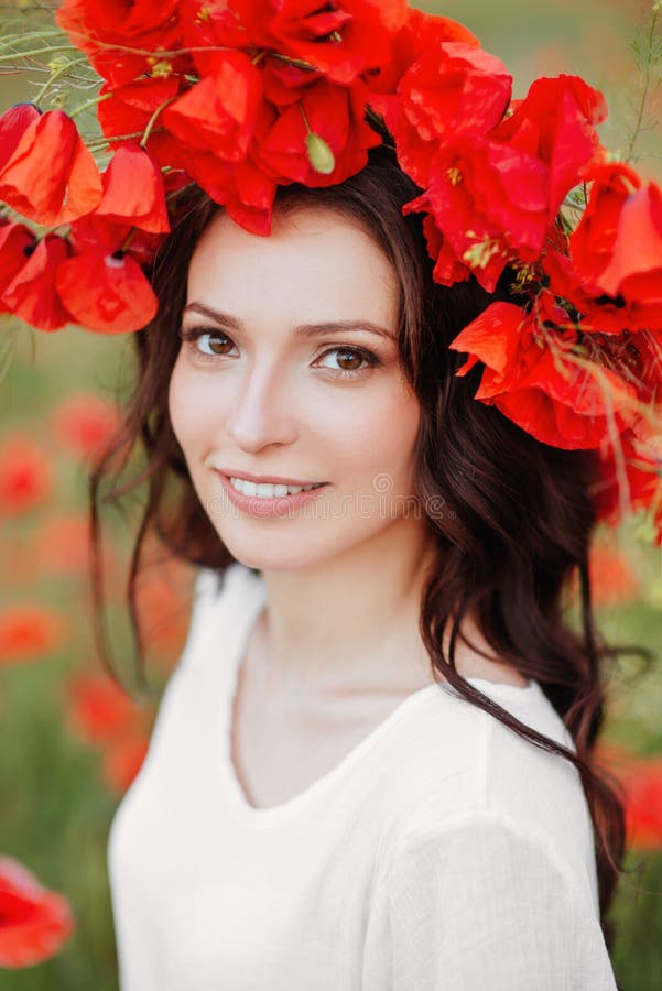 Beautiful girl in red poppy field royalty free stock photography Beautiful girl in red poppy field royalty free stock photography