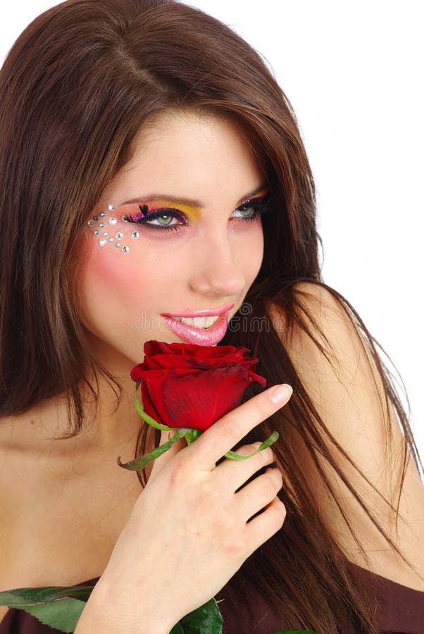 Beautiful girl with red rose