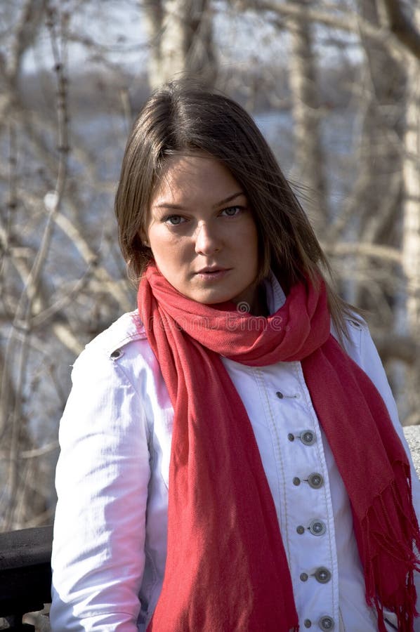 Beautiful girl in a red scarf