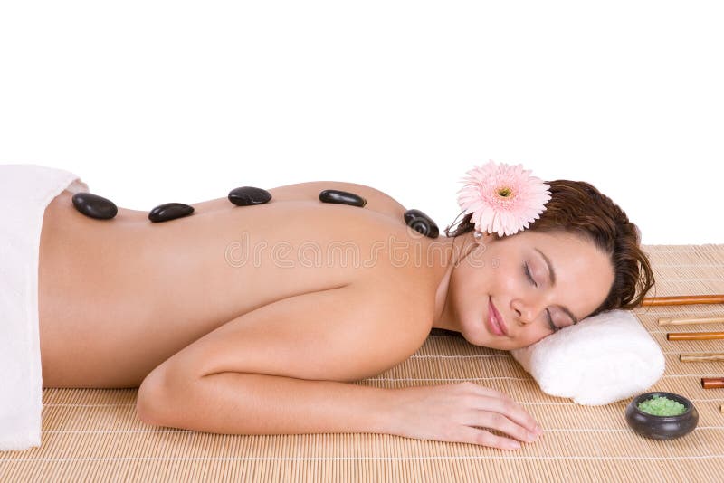 Beautiful girl relaxing on massage table