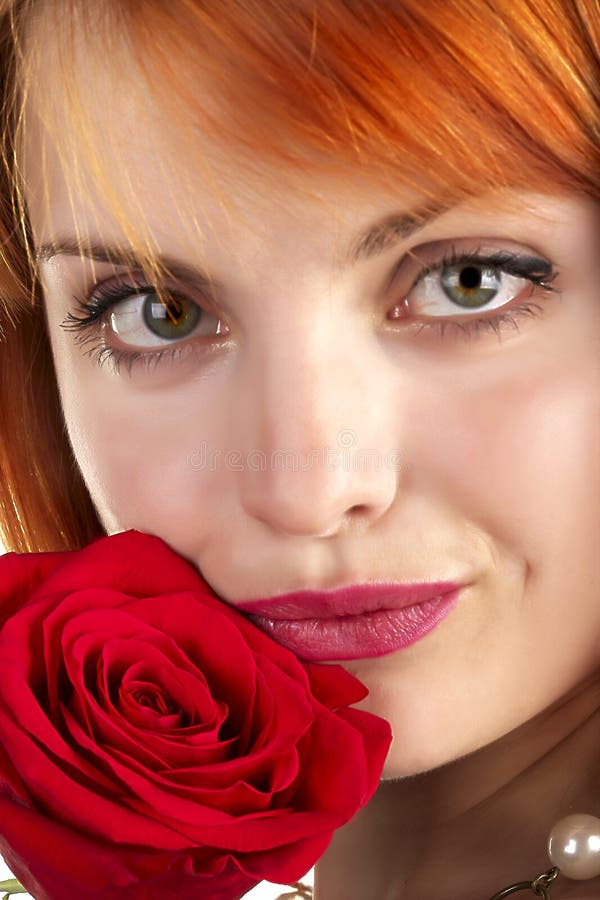 Beautiful girl with rose