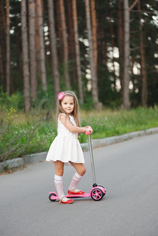 Beautiful Girl with Scooter on the Road Stock Image Image of kids