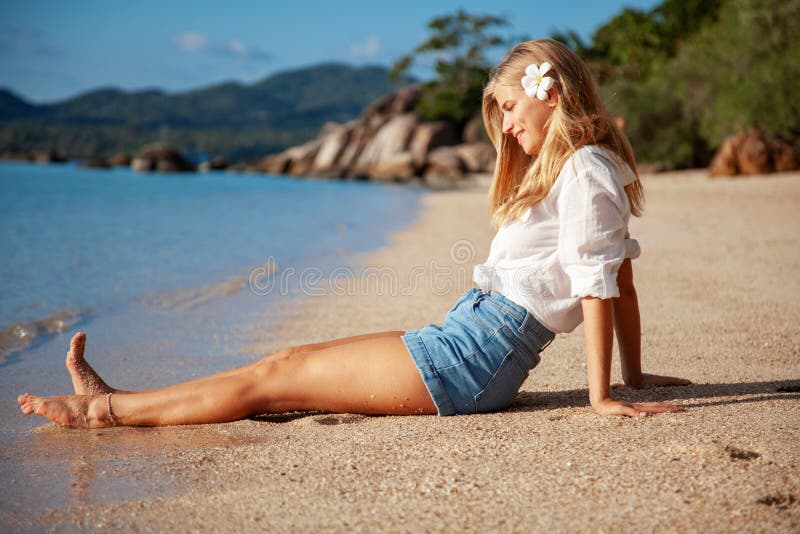 Beautiful Girl In Sea Style Sitting On Sand Travel And Vacation