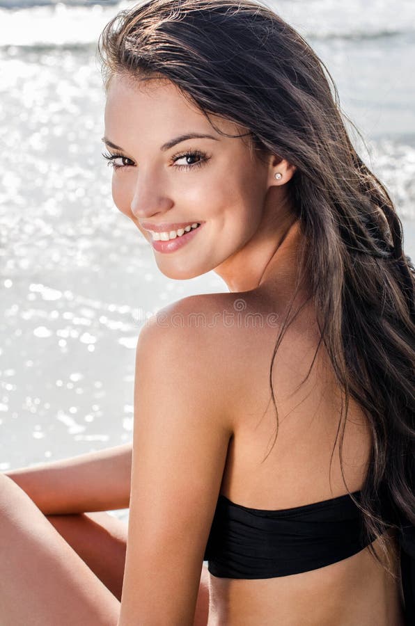 Beautiful girl at seaside smiling royalty free stock image Beautiful girl at seaside smiling royalty free stock image