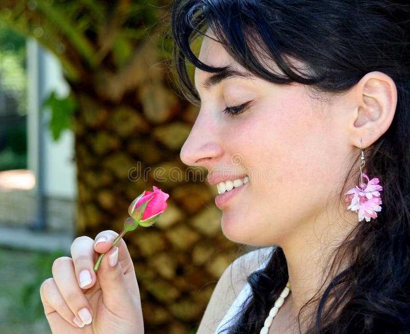 Beautiful Girl Smelling the Rose Stock Photo Image of hair, flower