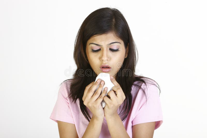 Beautiful girl with sneeze stock photography