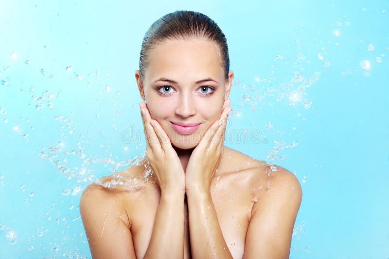 Beautiful girl and stream of water