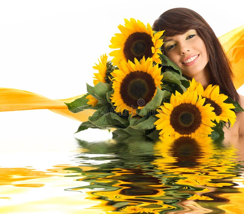 Beautiful girl with sunflowers