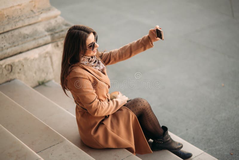 Beautiful girl in sunglasses make photo on smartphone. selfie royalty free stock photo Beautiful girl in sunglasses make photo on smartphone. selfie royalty free stock photo