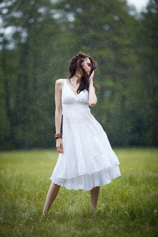 Beautiful girl under rain stock image. Image of fashion - 69032765