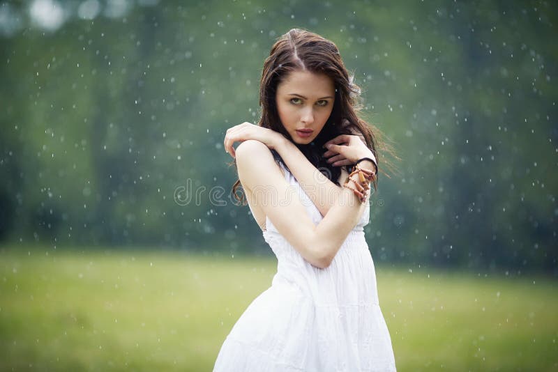 Beautiful girl under rain stock photo. Image of lovely 69032868