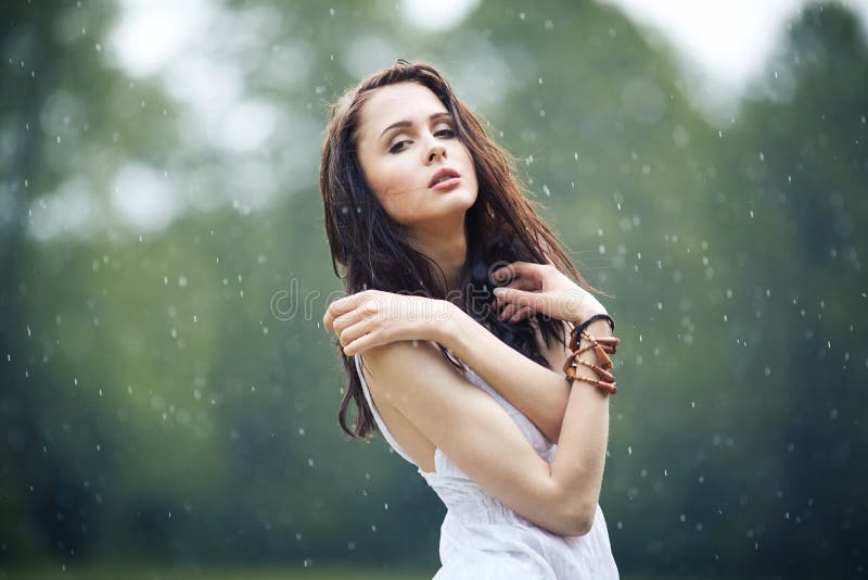 Beautiful girl under rain stock photo. Image of female 69032964