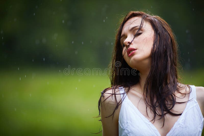 Beautiful girl under rain stock photo. Image of face 69034008