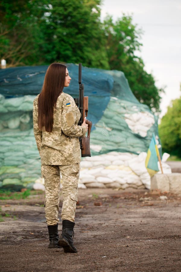 A Female Defender At A Roadblock Back View Stock Image Image Of Defend Machine 251361093