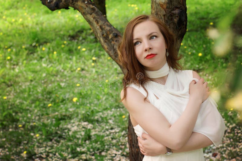 Smiling Cute Girl Standing In A Pose Against White Stock