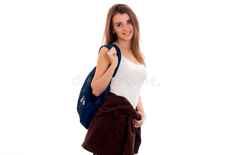 Beautiful girl in a white t-shirt and a portfolio on the shoulder stands up straight and looking at camera isolated on