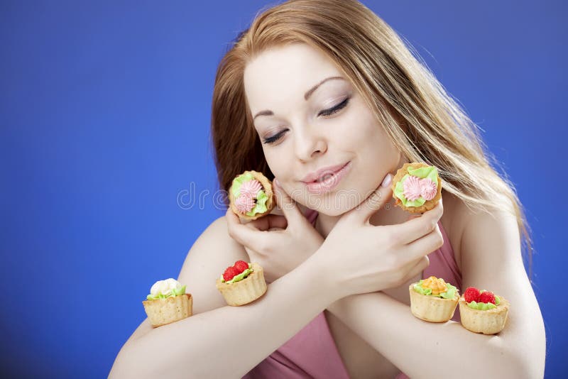 Beautiful girl who eats cakes