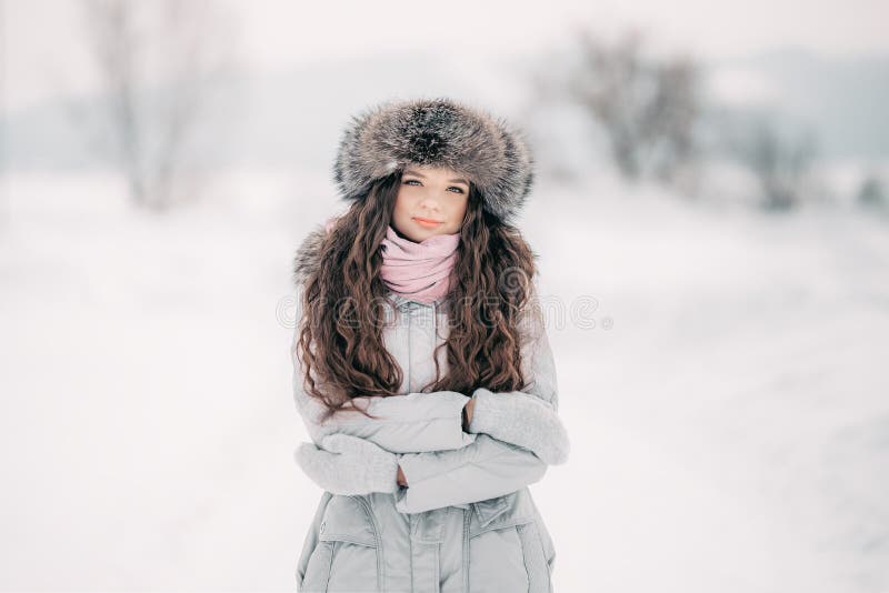 Beautiful Girl in Winter Fur Hat Smiling Play with Snow Stock Photo - Image  of cute, beautiful: 139592886