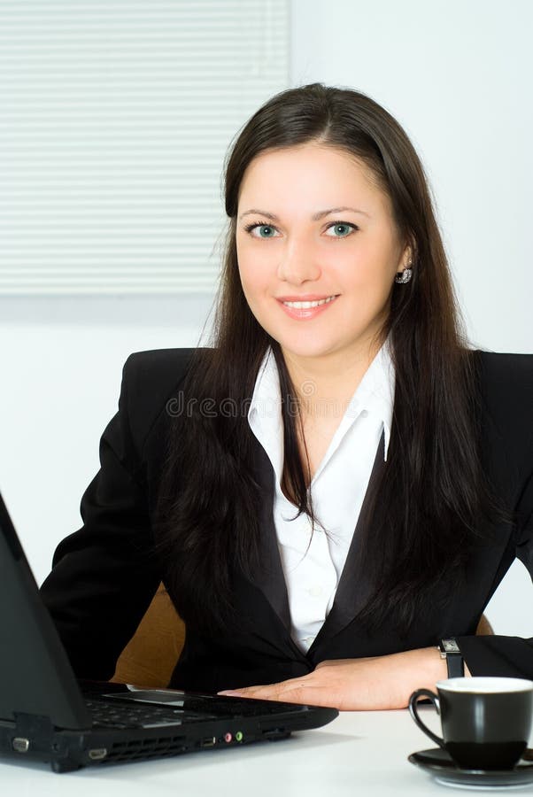 Beautiful girl working in the office