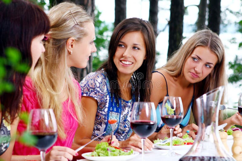 Beautiful girls drinking wine