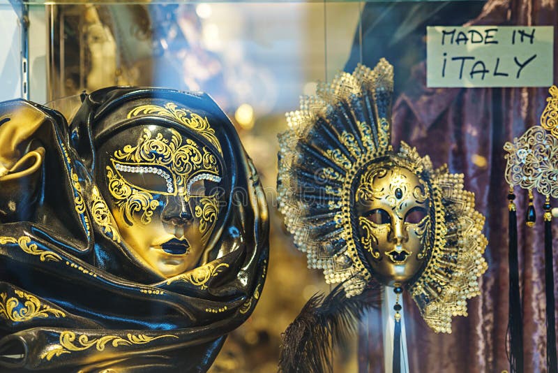 Beautiful gold elegant traditional venetian mask at carnival in Venice, Italy. Venice carnival masks, gold and black, selective royalty free stock image Beautiful gold elegant traditional venetian mask at carnival in Venice, Italy. Venice carnival masks, gold and black, selective royalty free stock image