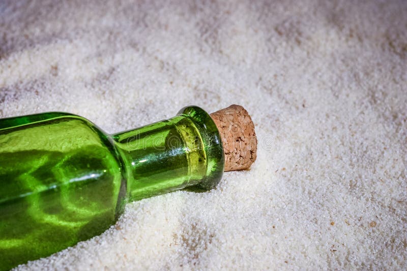 A Beautiful Green Bottle in the Sand Stock Image Image of abstract