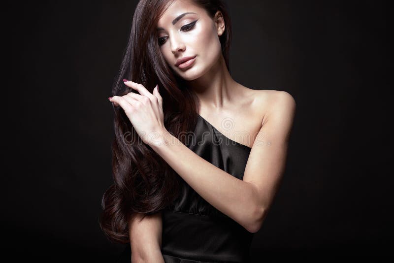 Beautiful Hair Girl in black dress. fashion beauty portrait royalty free stock images Beautiful Hair Girl in black dress. fashion beauty portrait royalty free stock images