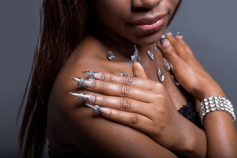 As a brown skin female, what would be the perfect nail color to get for Acrylic  nails? - Quora