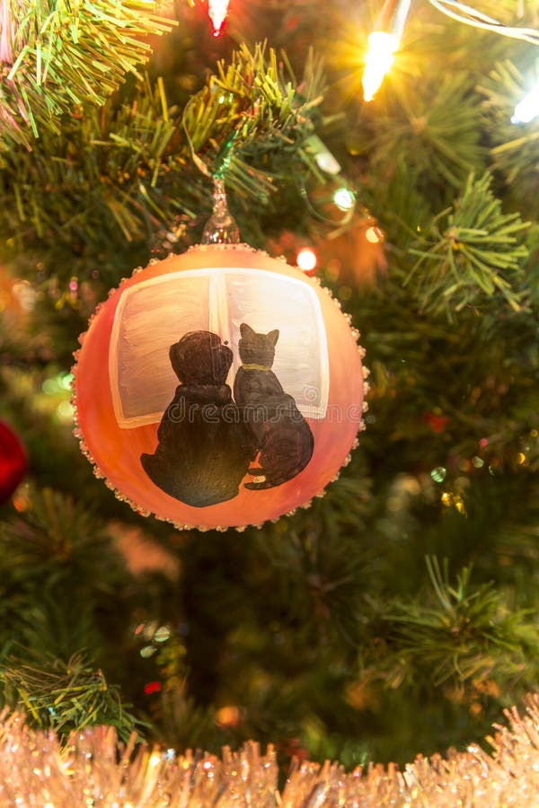 Beautiful hand made glass ball with animals on Christmas Tree stock images Beautiful hand made glass ball with animals on Christmas Tree stock images