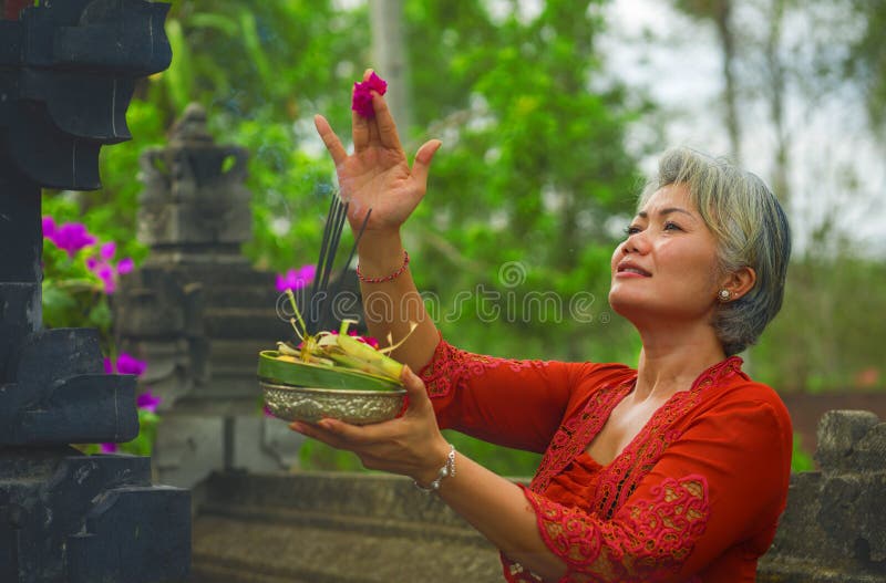 Beautiful And Happy Asian Indonesian Woman Dressed In Traditional