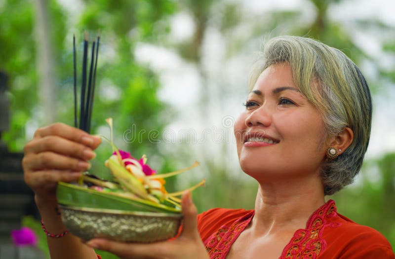 Beautiful And Happy Asian Indonesian Woman Dressed In Traditional