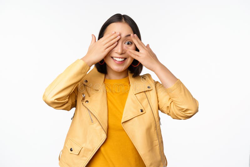 Woman blindfolded, smiling - Stock Image - F003/3209 - Science Photo Library