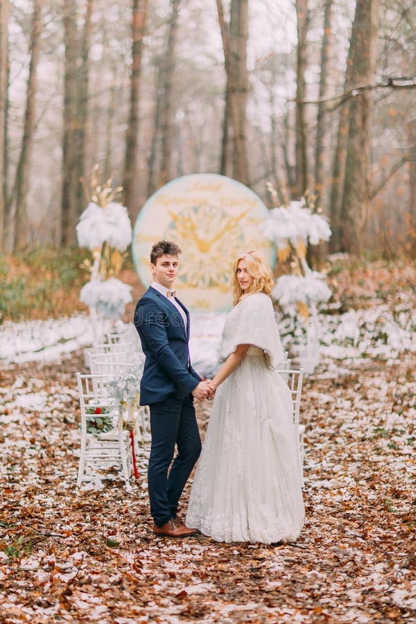 Beautiful happy couple on the wedding ceremony in autumn forest royalty free stock photos Beautiful happy couple on the wedding ceremony in autumn forest royalty free stock photos