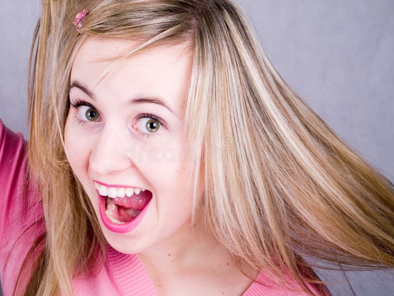 Beautiful and happy girl with long hair