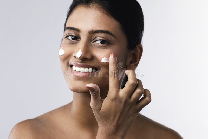 Beautiful Indian woman with smooth skin and long black hair Stock Photo