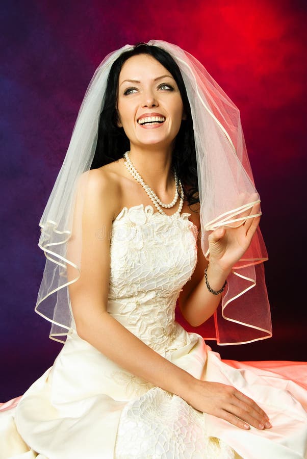 Beautiful happy laughing bride
