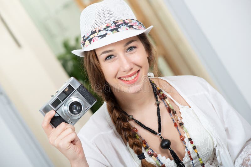 Beautiful hippie woman with a retro camera royalty free stock photo Beautiful hippie woman with a retro camera royalty free stock photo