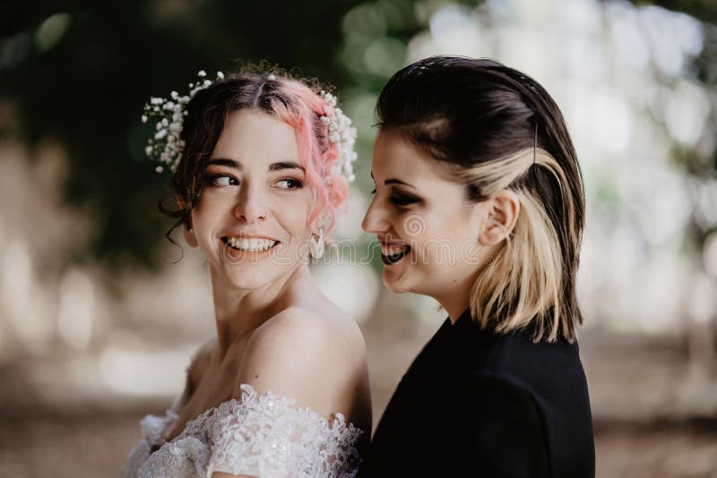 Beautiful Hispanic Lesbian Couple In A Photo Section For Their Wedding Stock Image Image Of