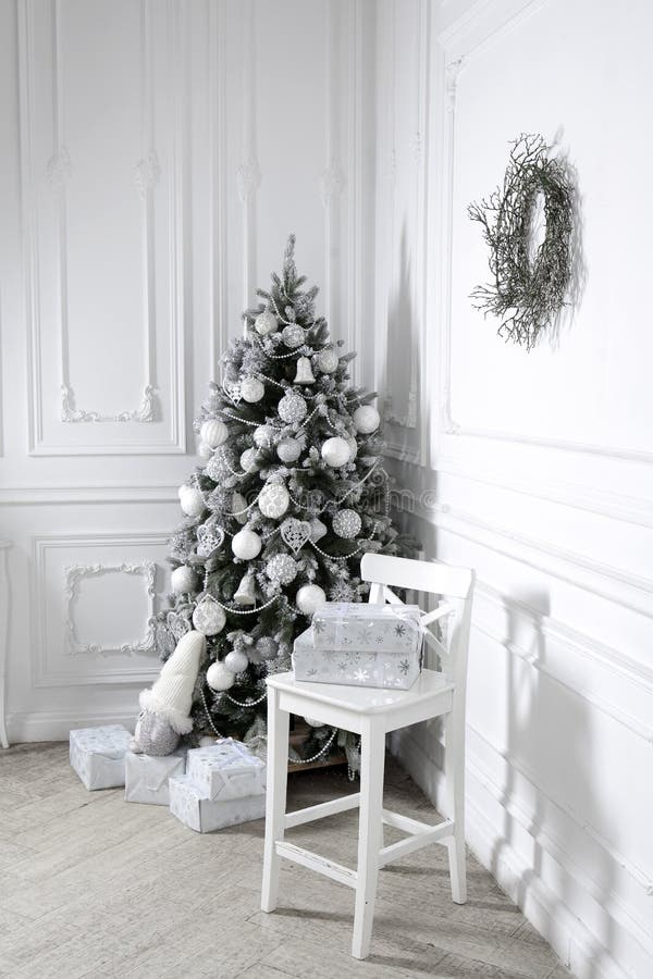 Beautiful holiday decorated room with Christmas tree