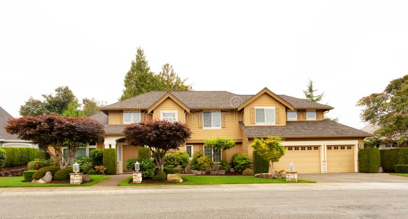 Beautiful Home exterior with landscape yard and trees