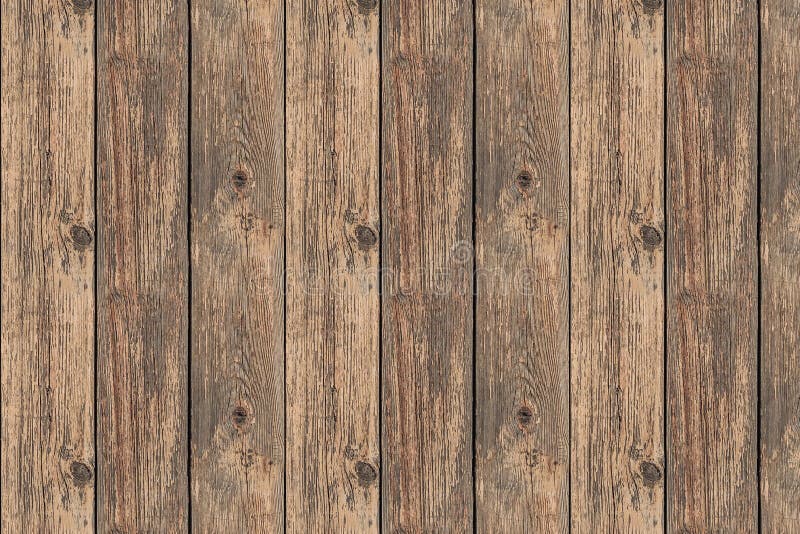 A beautiful horizontal texture of old yellow and brown boards with knots in the photo. Seamless pattern royalty free stock images