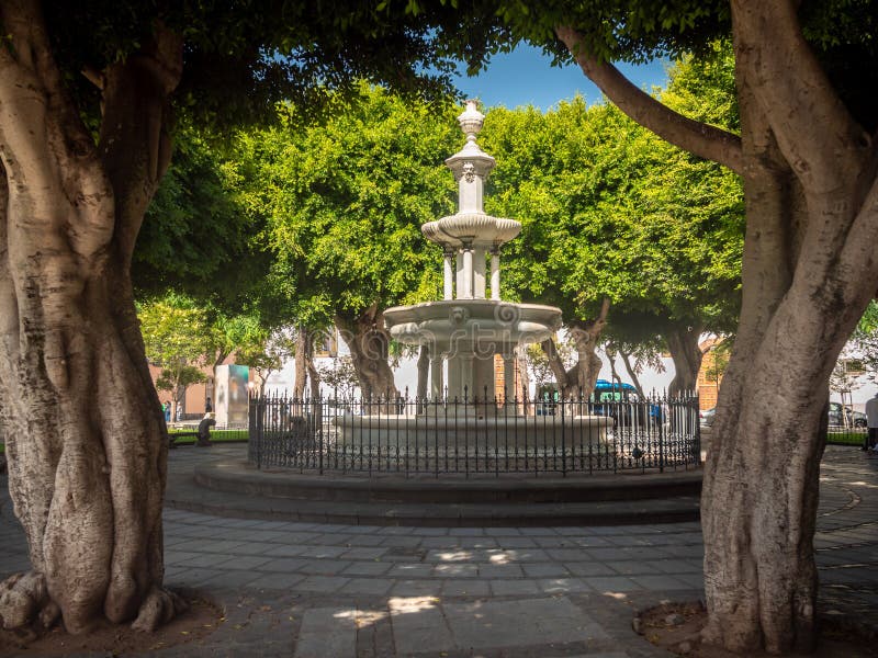 Beautiful Image of Stone Fountain on Square at Park Editorial