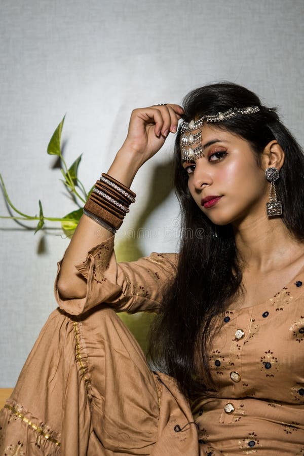 Beautiful Indian Girl with Makeup and a Fashionable Hairstyle Poses Stock Photo - Image of hairstyle, indian: 204590052 Beautiful Indian Girl with Makeup and a Fashionable Hairstyle Poses Stock Photo - Image of hairstyle, indian: 204590052